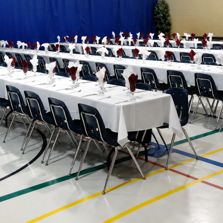 The Limoges Community Centre set up for a banquet or special event, featuring decorated tables and seating arranged throughout the hall.